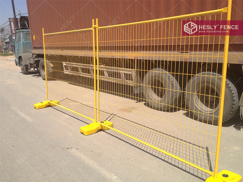 yellow temporary fencing panels
